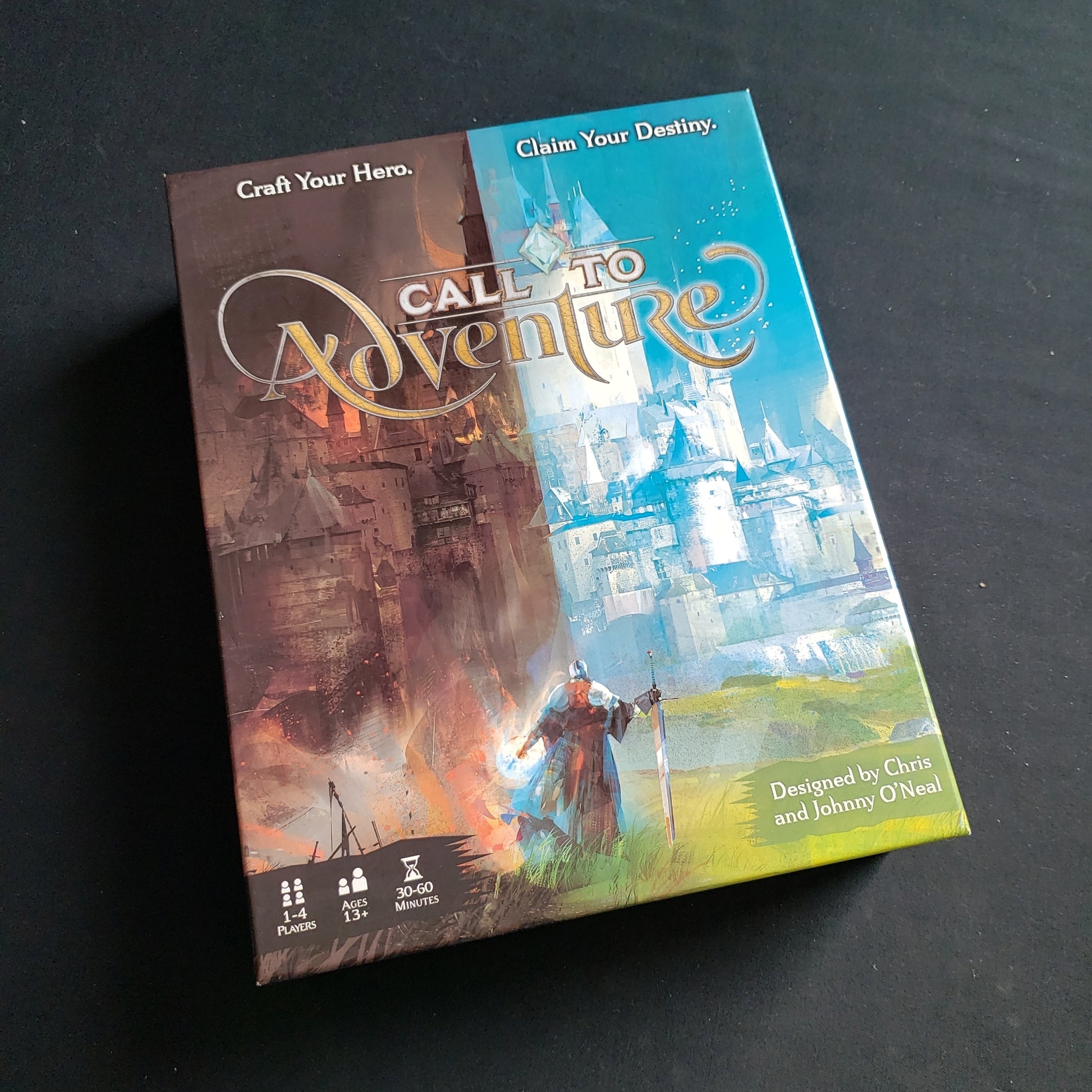 Image shows the front cover of the box of the Call to Adventure card game