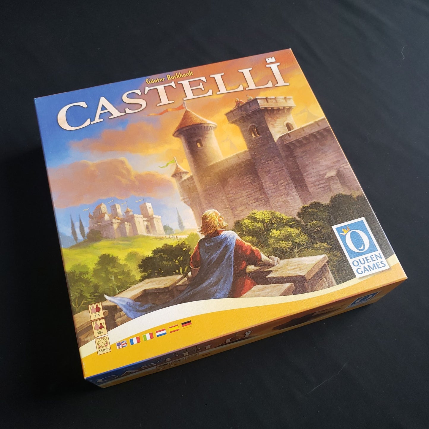 Image shows the front cover of the box of the Castelli board game