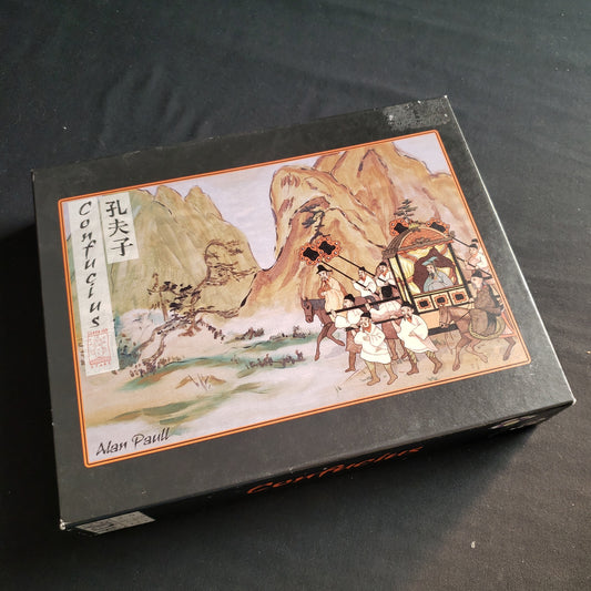 Image shows the front cover of the box of the Confucius board game