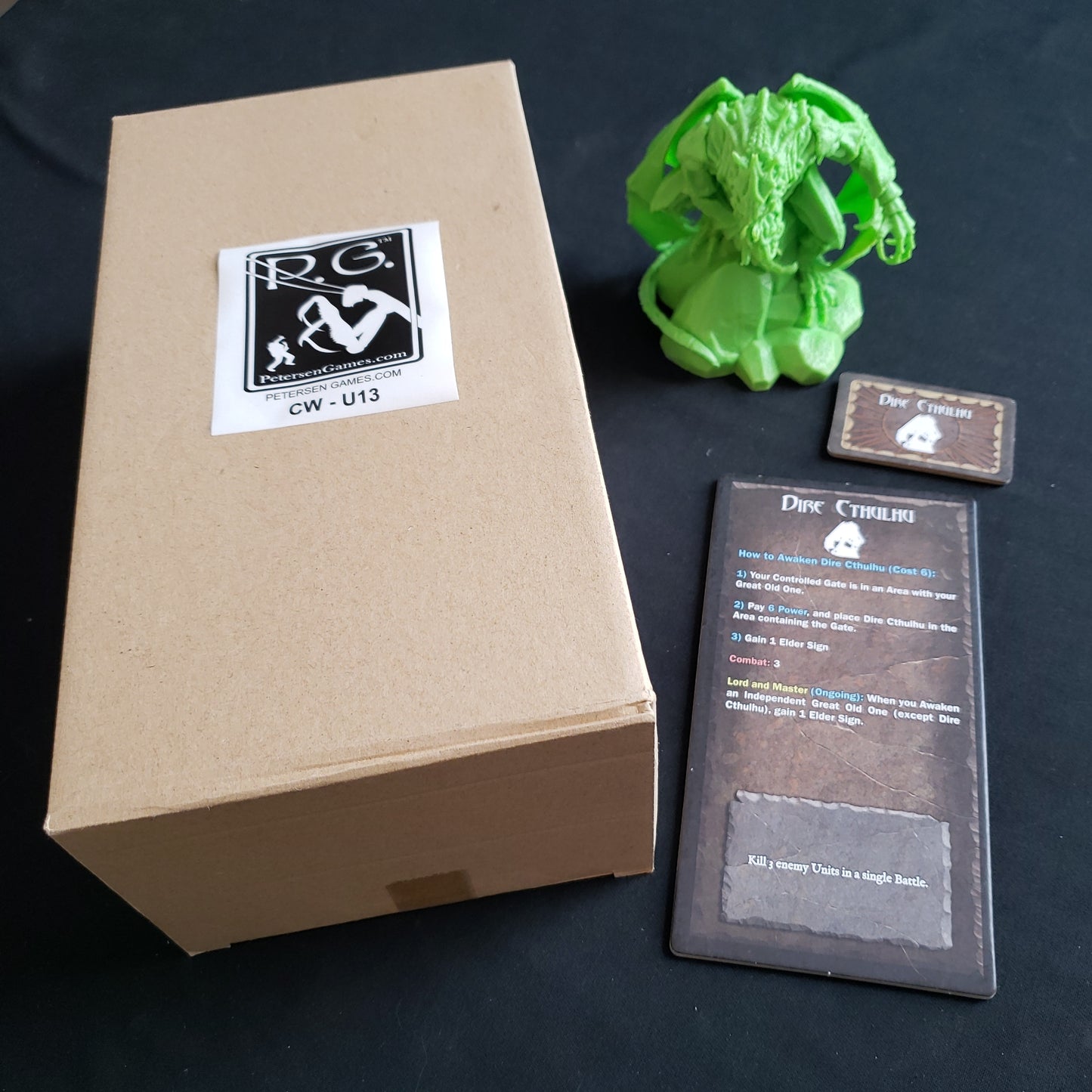 Image shows the box, miniature and components for the Dire Cthulhu Expansion for the Cthulhu Wars board game
