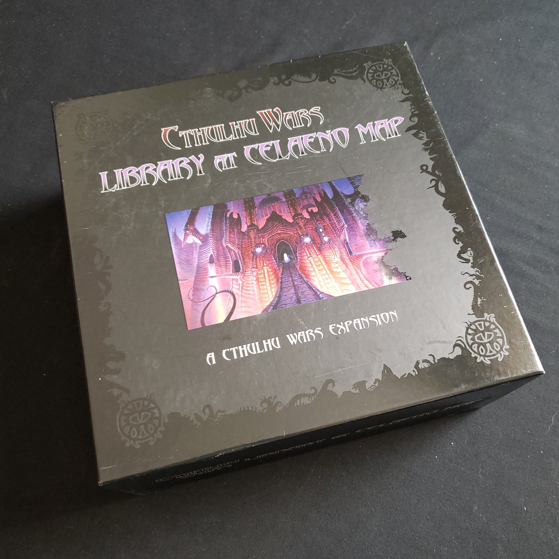 Image shows the front of the box for the Library at Celaeno Map Expansion for the Cthulhu Wars board game