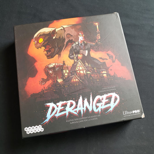 Image shows the front cover of the box of the Deranged board game