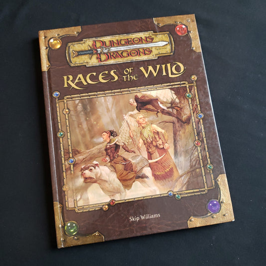 Image shows the front cover of the Races of the Wild book for the Dungeons & Dragons 3.5 roleplaying game