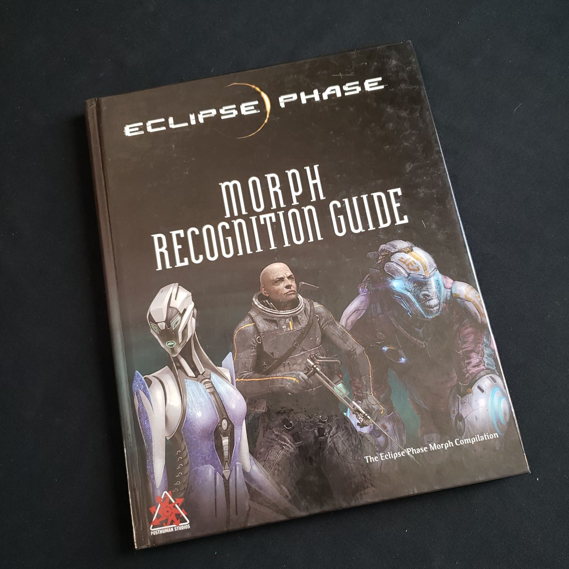 Image shows the front cover of the Morph Recognition Guide book for the Eclipse Phase roleplaying game