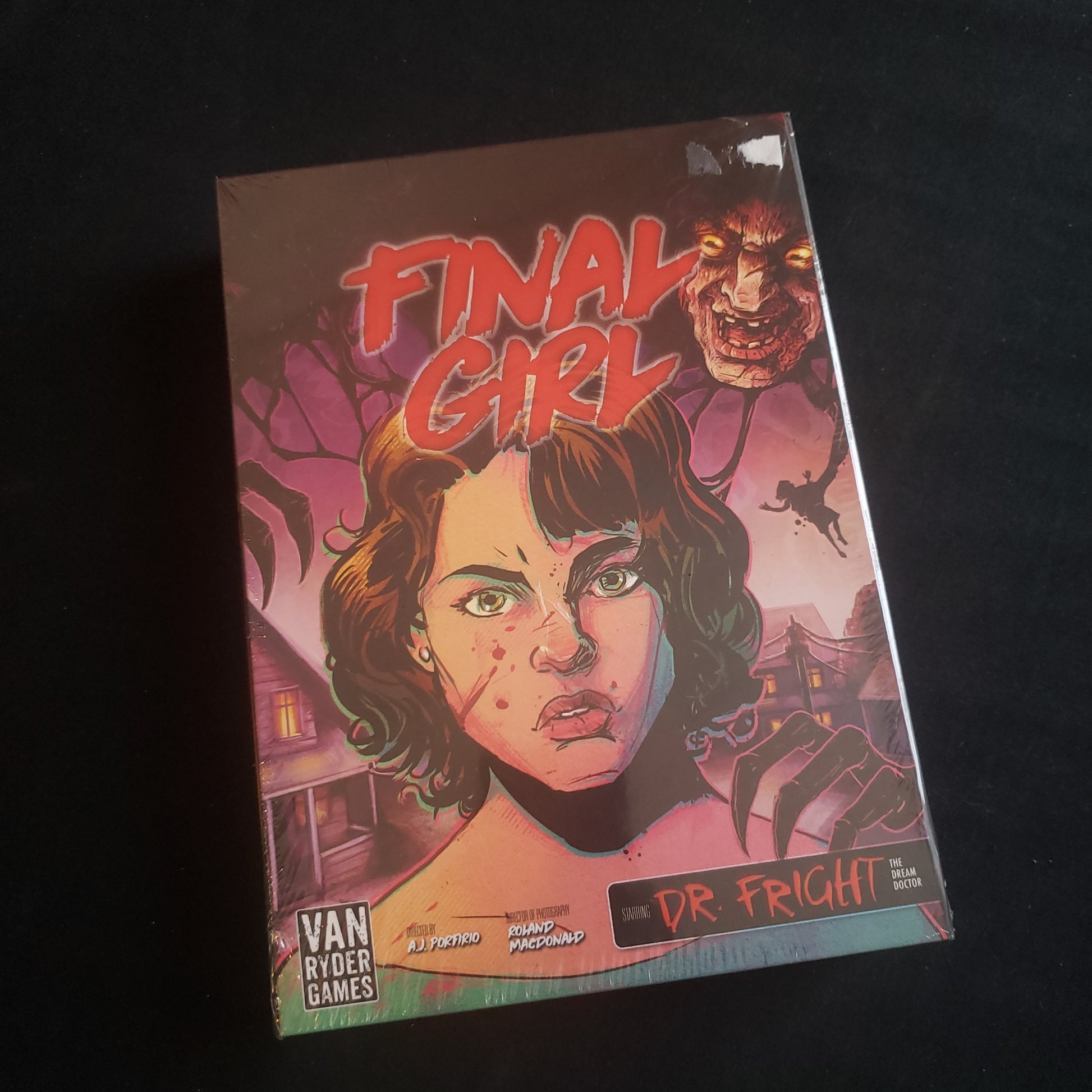 Image shows the front cover of the box of the Frightmare on Maple Lane expansion for the Final Girl board game