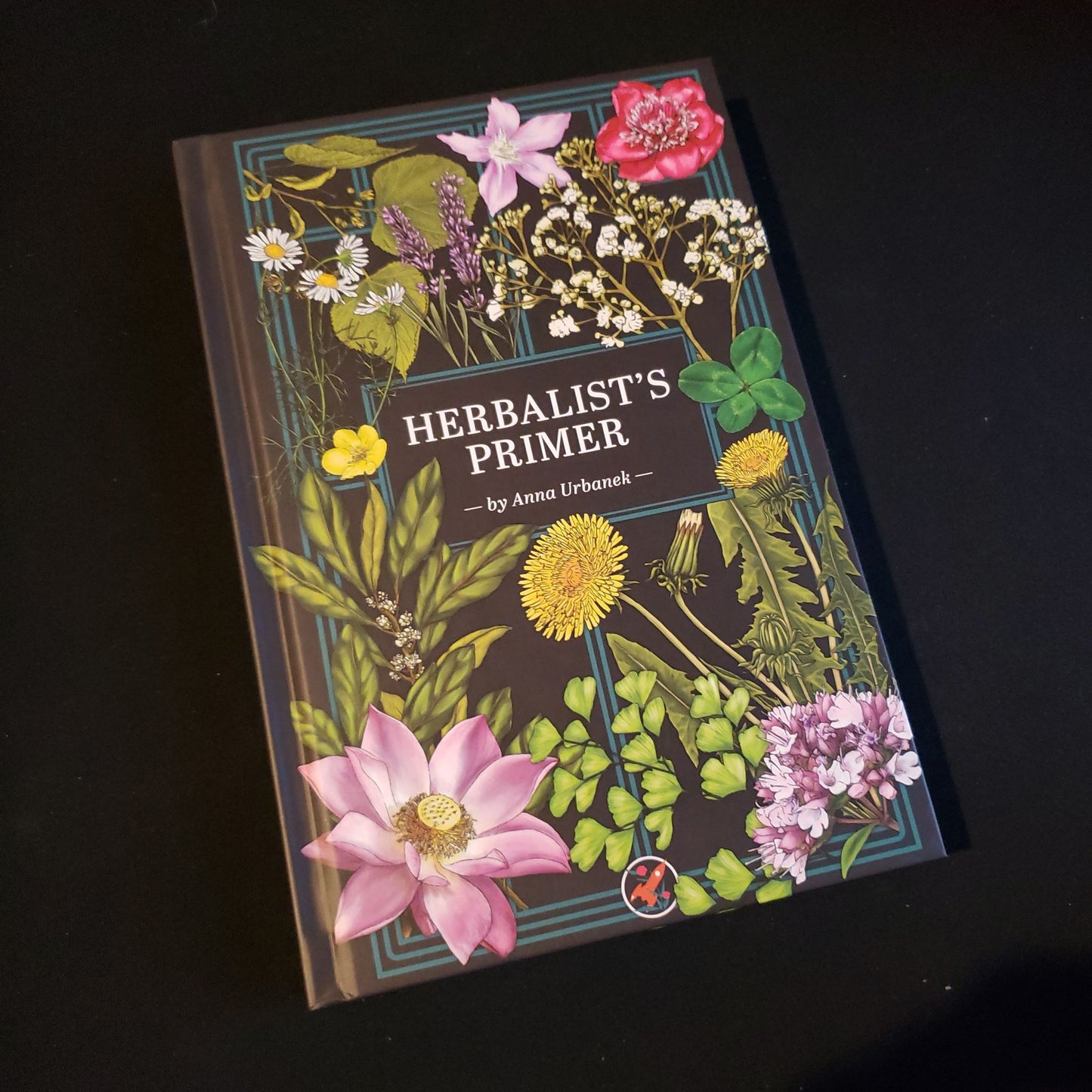Image shows the front cover of the Herbalist's Primer roleplaying game book