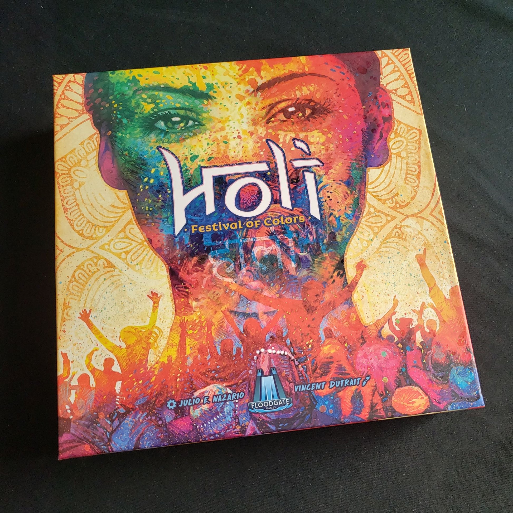 Image shows the front cover of the box of the Holi: Festival of Colors board game