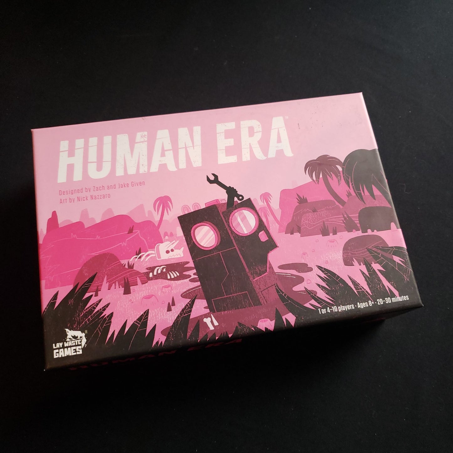 Image shows the front cover of the box of the Human Era board game