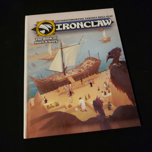 Image shows the front cover of the Book Of Horn & Ivory for the Ironclaw roleplaying game