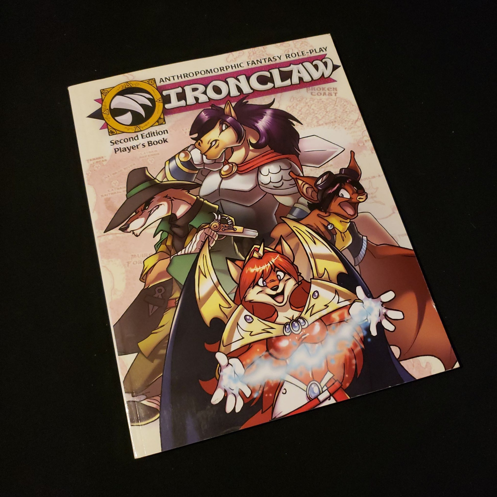 Image shows the front cover of the Second Edition Player's Book for the Ironclaw roleplaying game