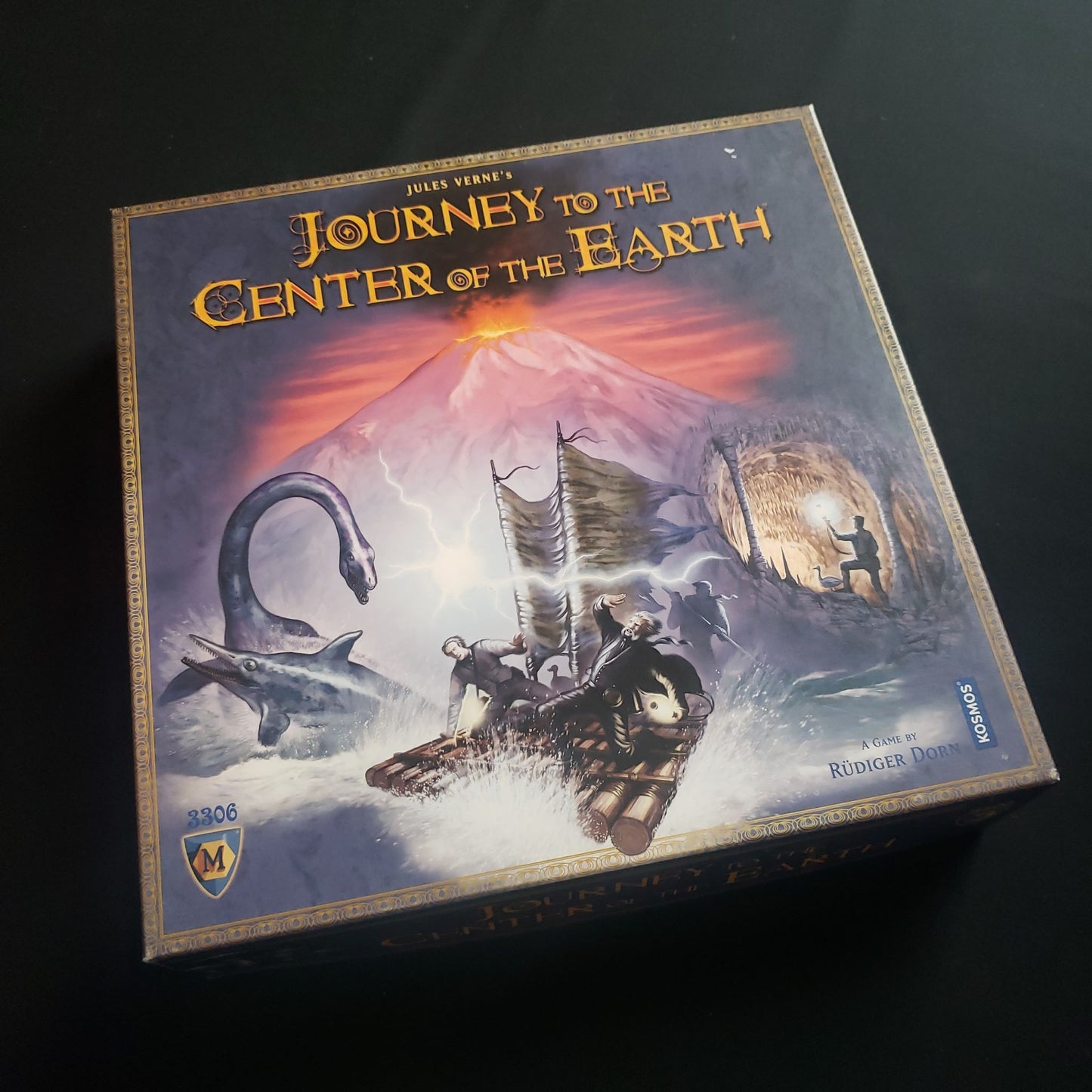 Image shows the front cover of the box of the Journey to the Center of the Earth board game