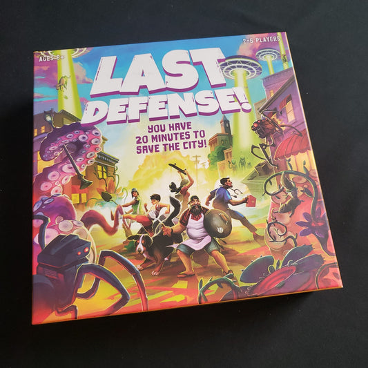 Image shows the front cover of the box of the Last Defense board game
