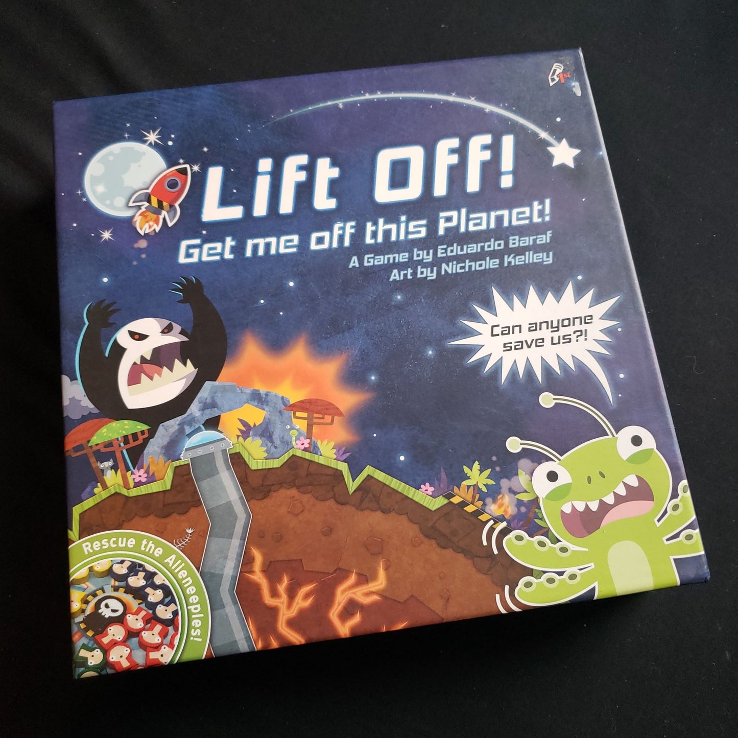 Image shows the front cover of the box of the Lift Off: Get me Off This Planet board game