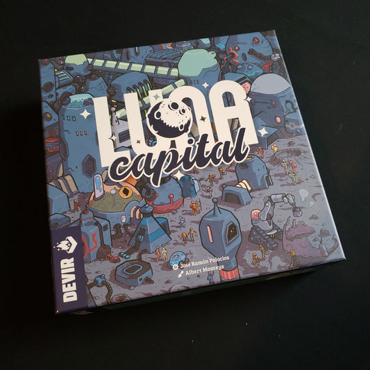 Image shows the front cover of the box of the Luna Capital board game