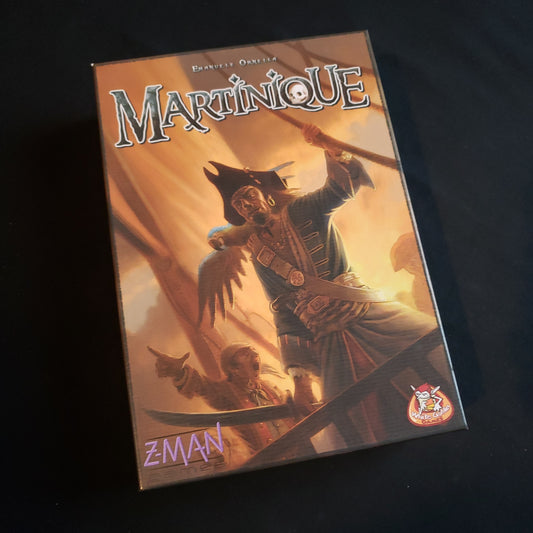 Image shows the front cover of the box of the Martinique board game