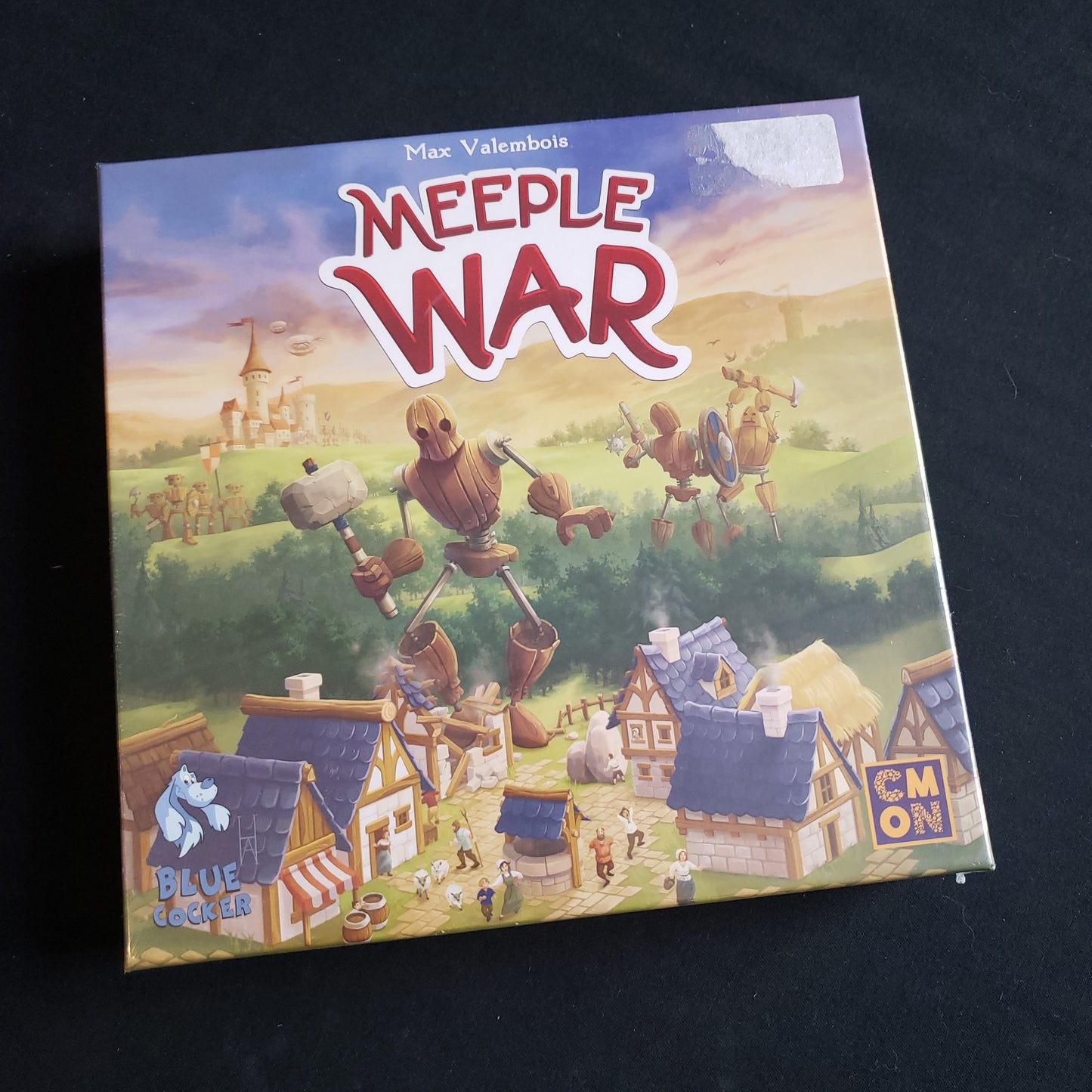 Image shows the front cover of the box of the Meeple War board game