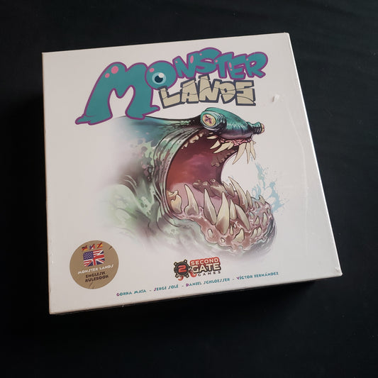 Image shows the front cover of the box of the Monster Lands board game