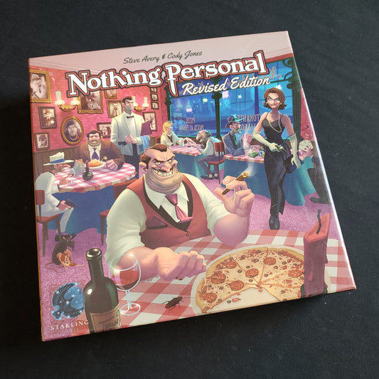 Image shows the front cover of the box of the Nothing Personal board game