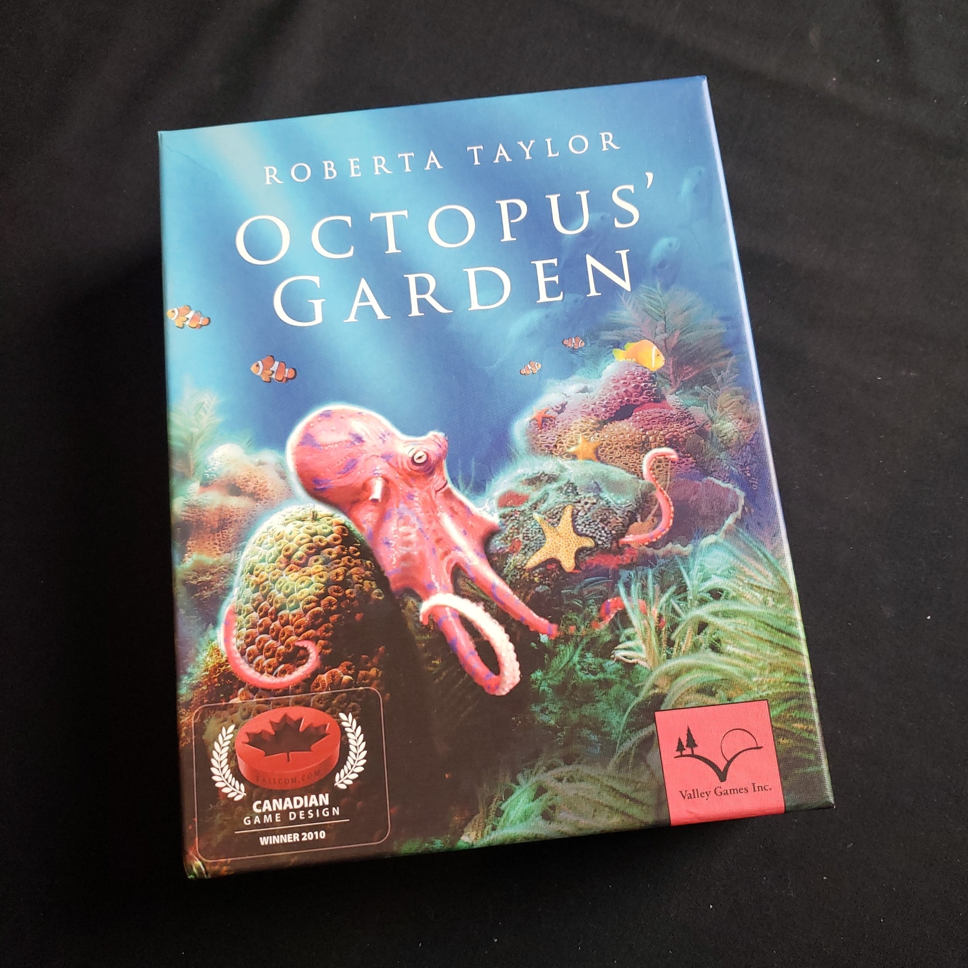 Image shows the front cover of the box of the Octopus Garden board game