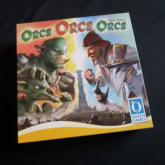 Image shows the front cover of the box of the Orcs Orcs Orcs board game