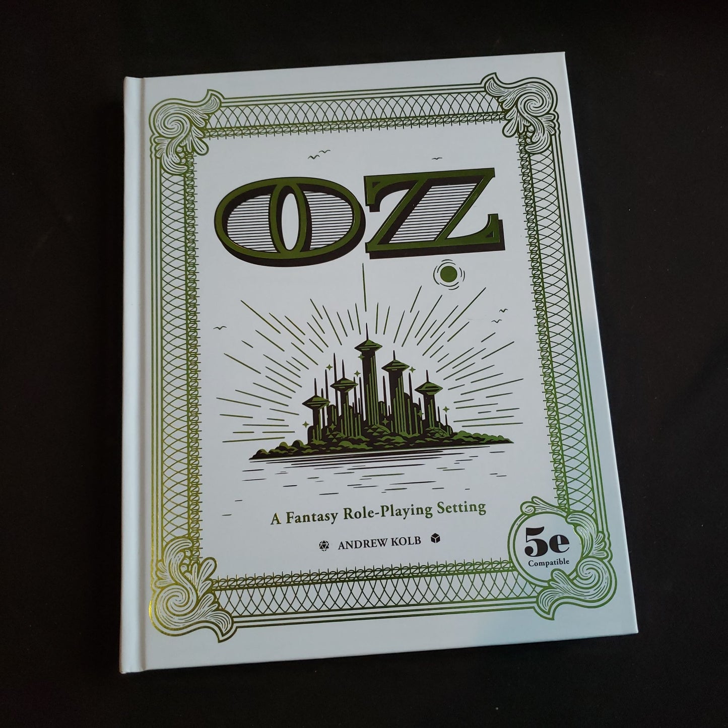 Image shows the front cover of the OZ roleplaying game book