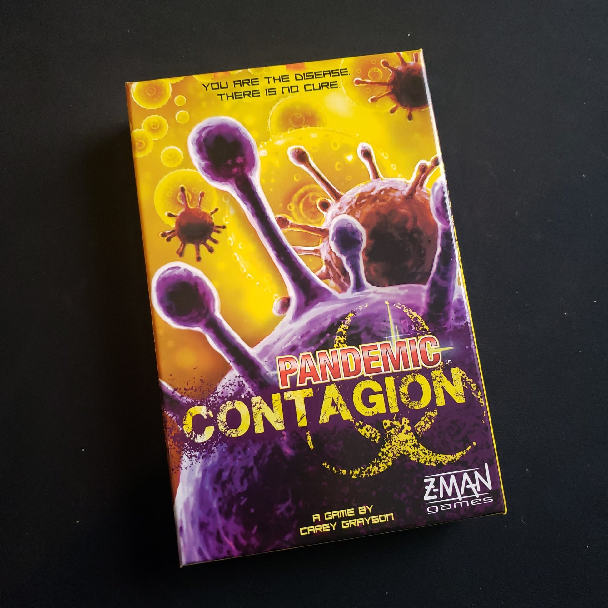 Image shows the front cover of the box of the Pandemic: Contagion board game