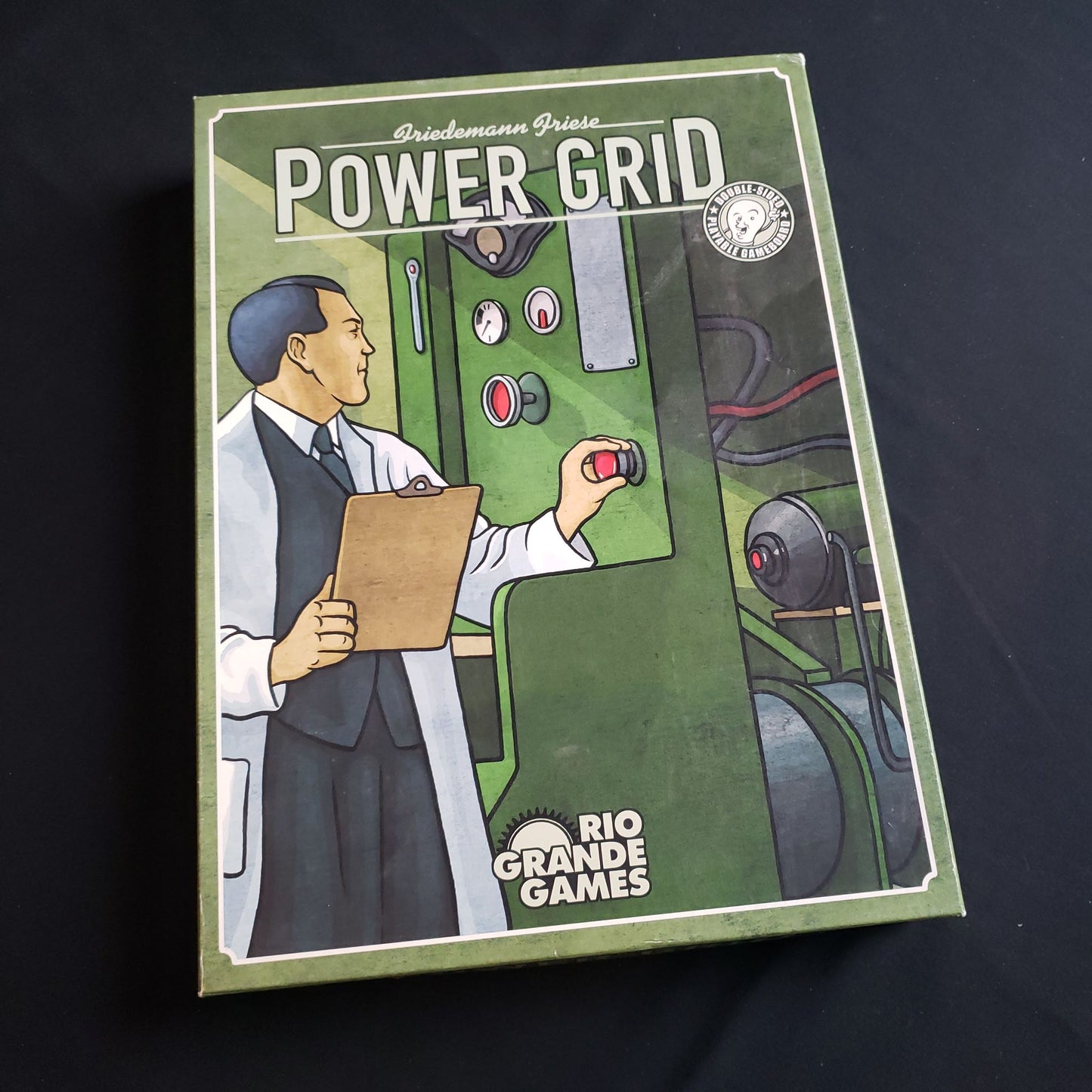Image shows the front cover of the box of the Power Grid board game