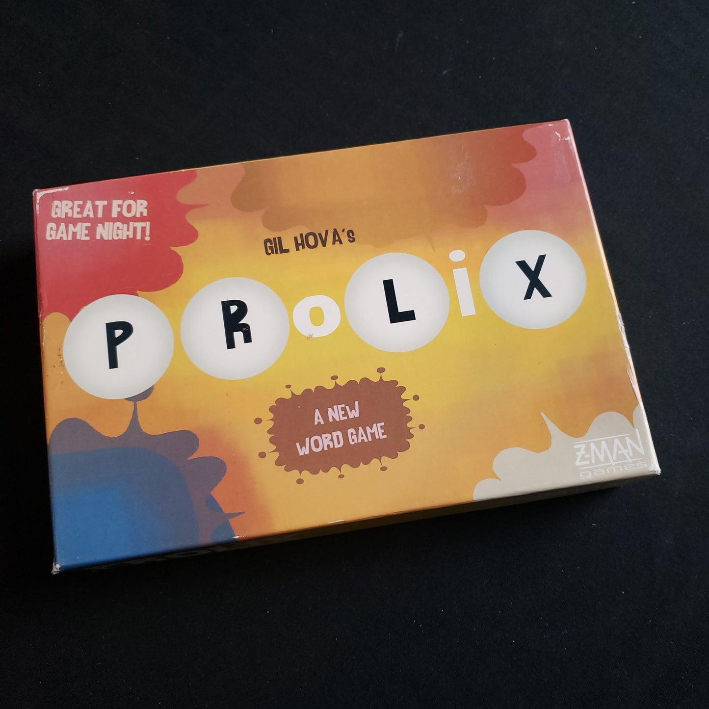 Image shows the front cover of the box of the Prolix word game