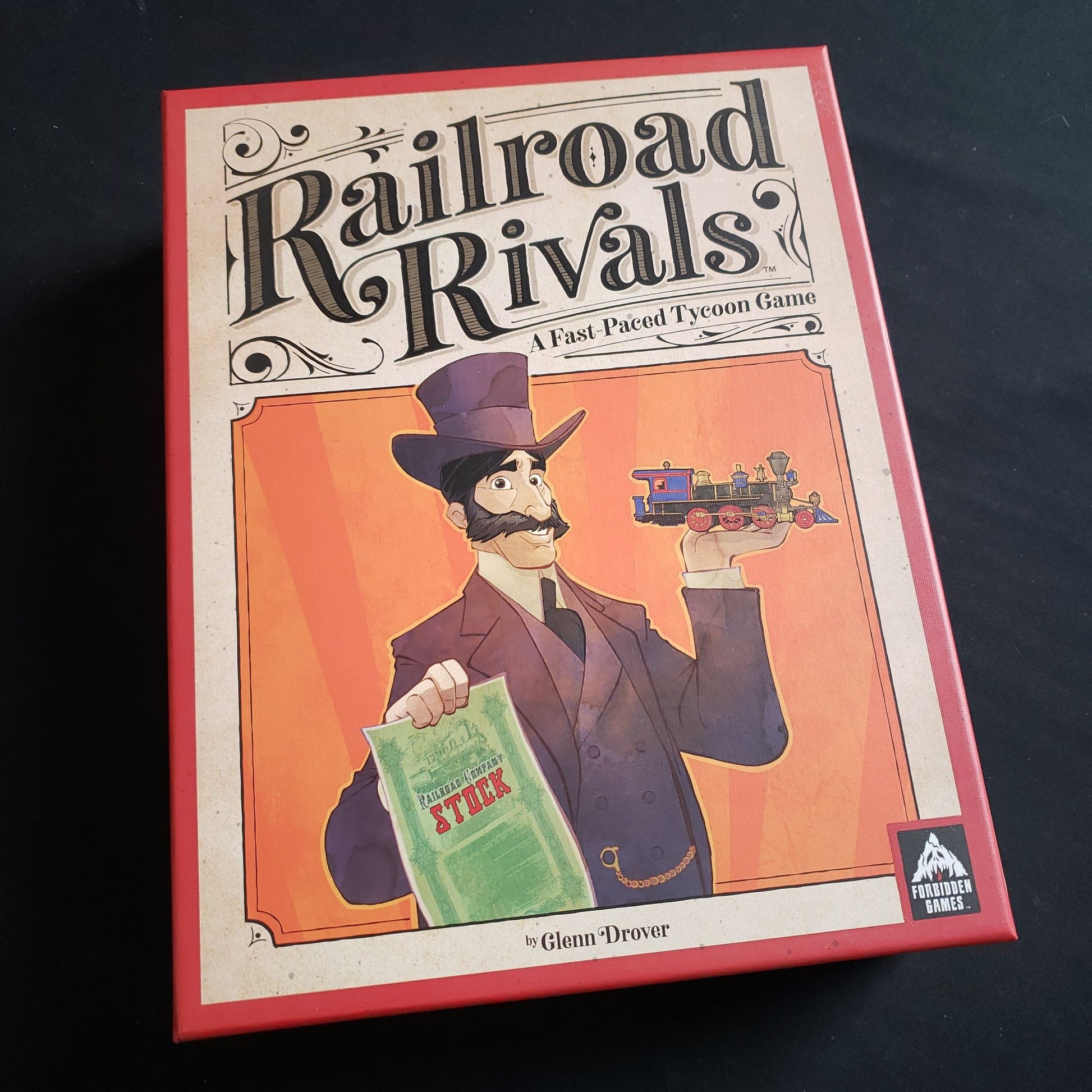 Image shows the front cover of the box of the Railroad Rivals board game