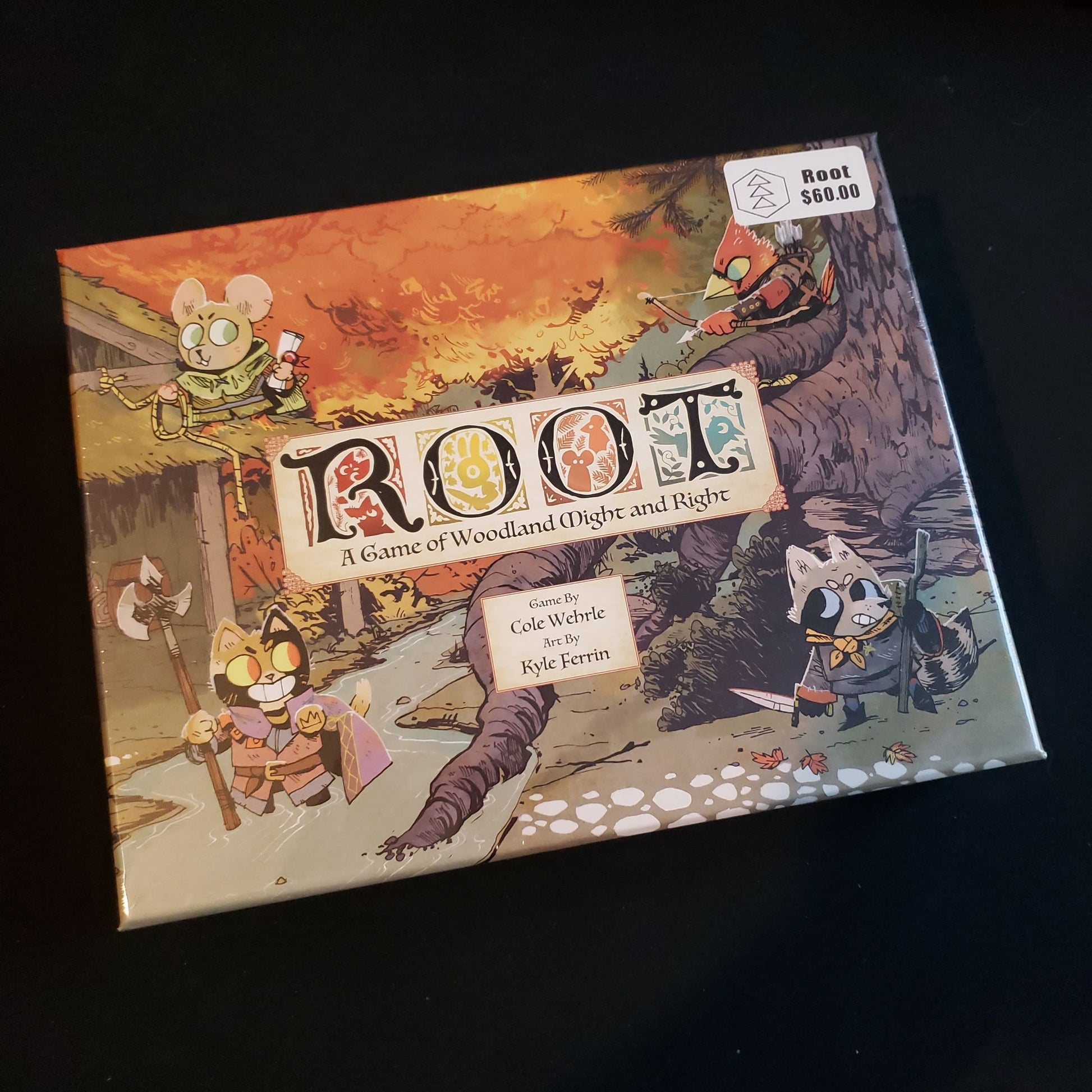 Image shows the front cover of the box of the Root board game