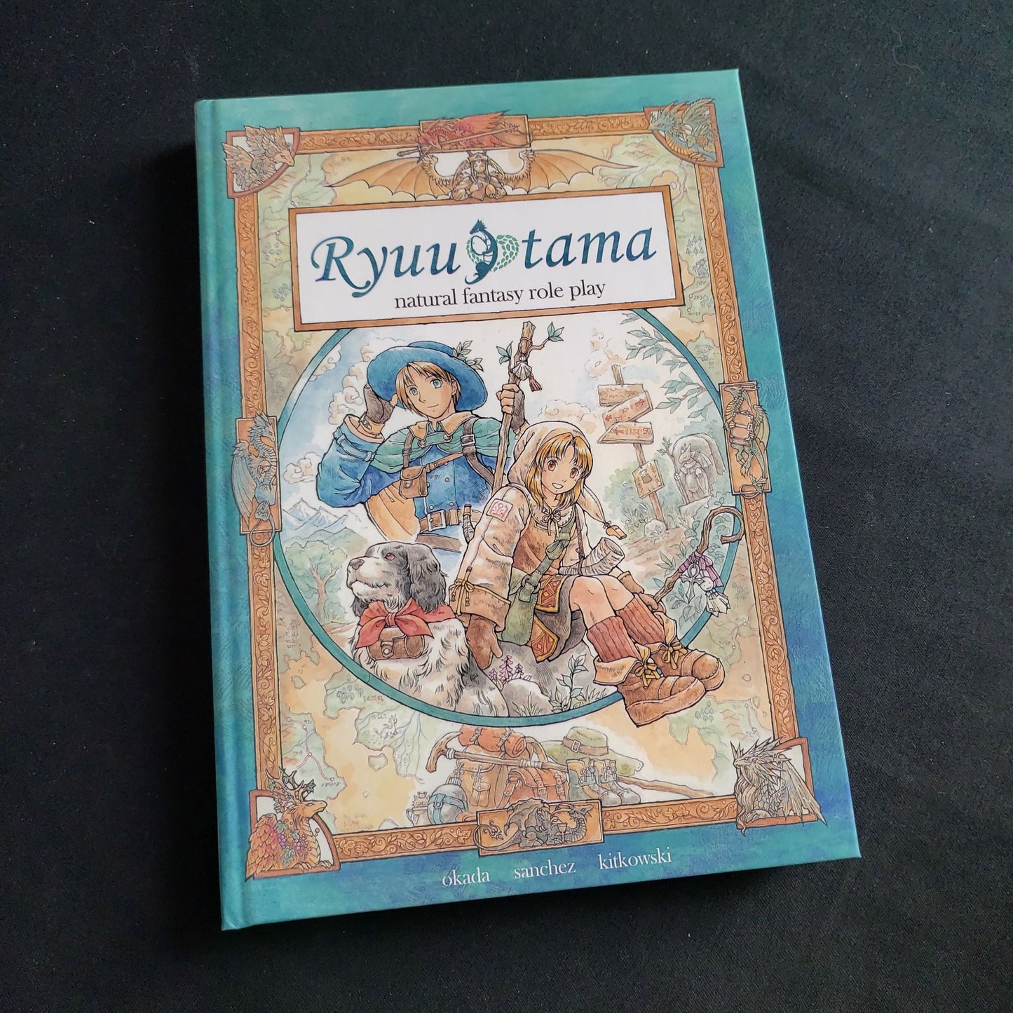 Image shows the front cover of the Ryuutama roleplaying game book