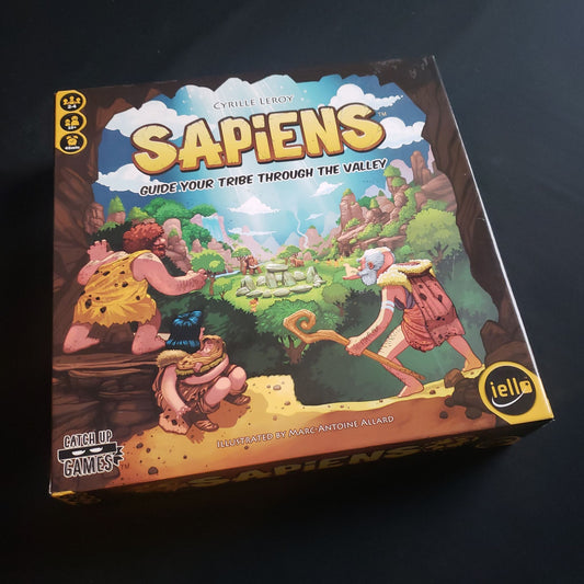 Image shows the front cover of the box of the Sapiens board game