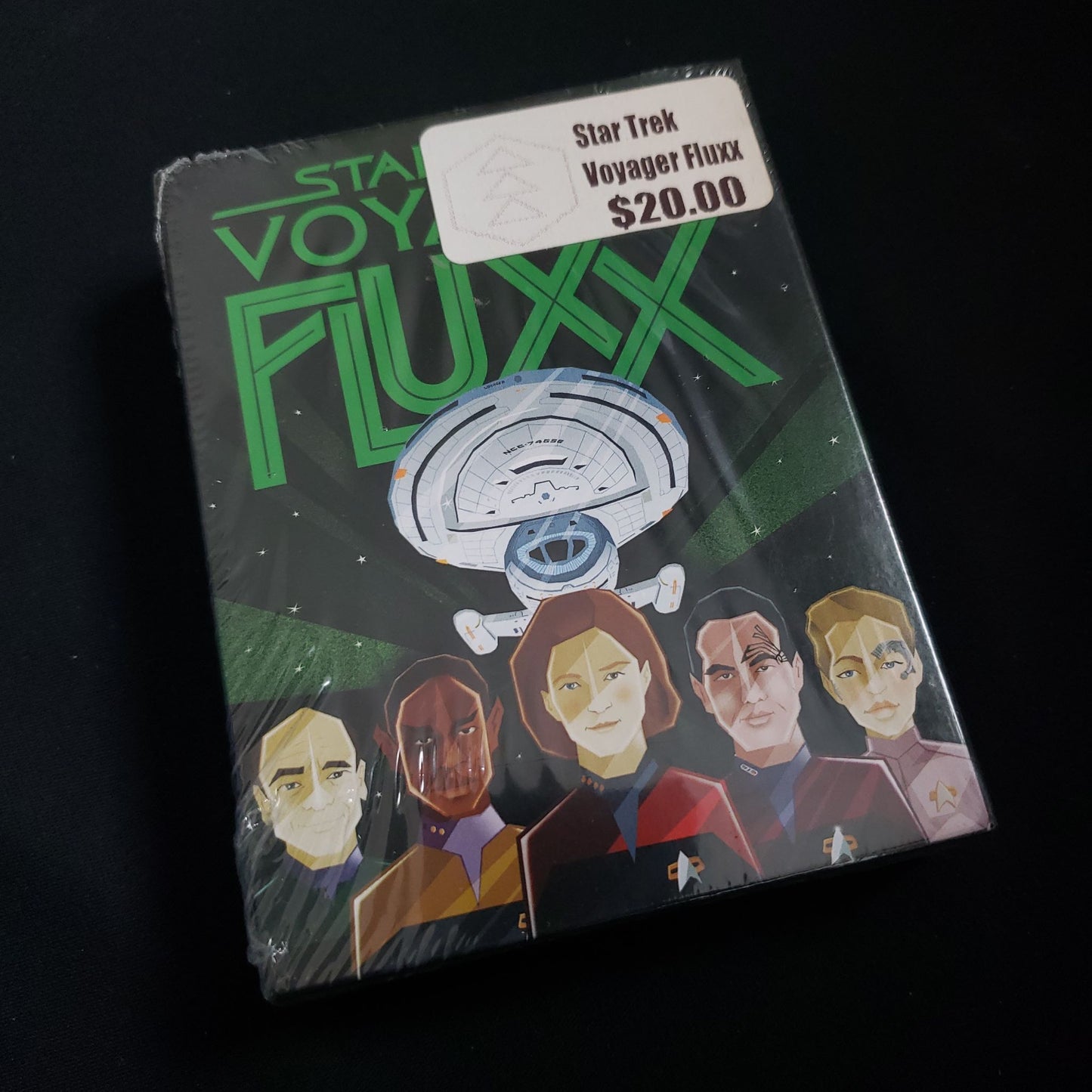 Image shows the front cover of the box of the Star Trek Voyager Fluxx card game