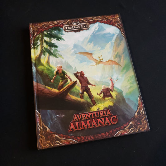 Image shows the front cover of the Aventuria Almanac book for the Dark Eye roleplaying game