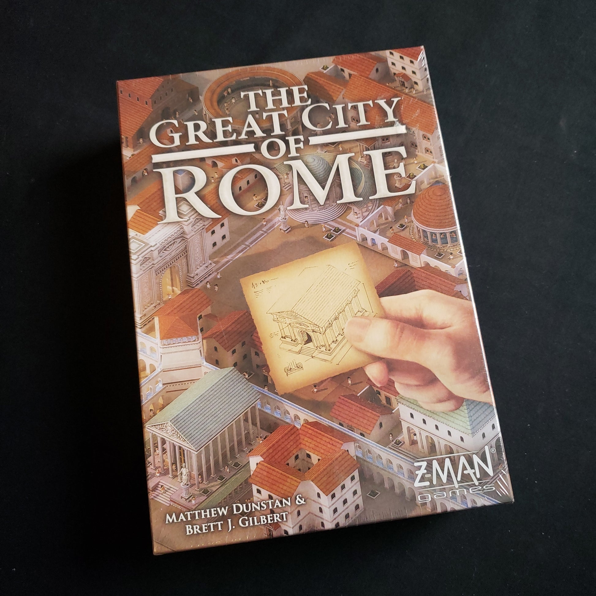 Image shows the front cover of the box of the Great City of Rome board game