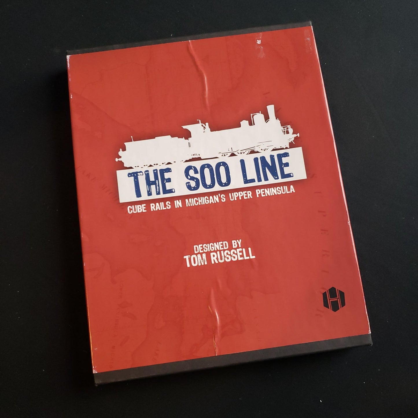 Image shows the front cover of the box of the Soo Line board game