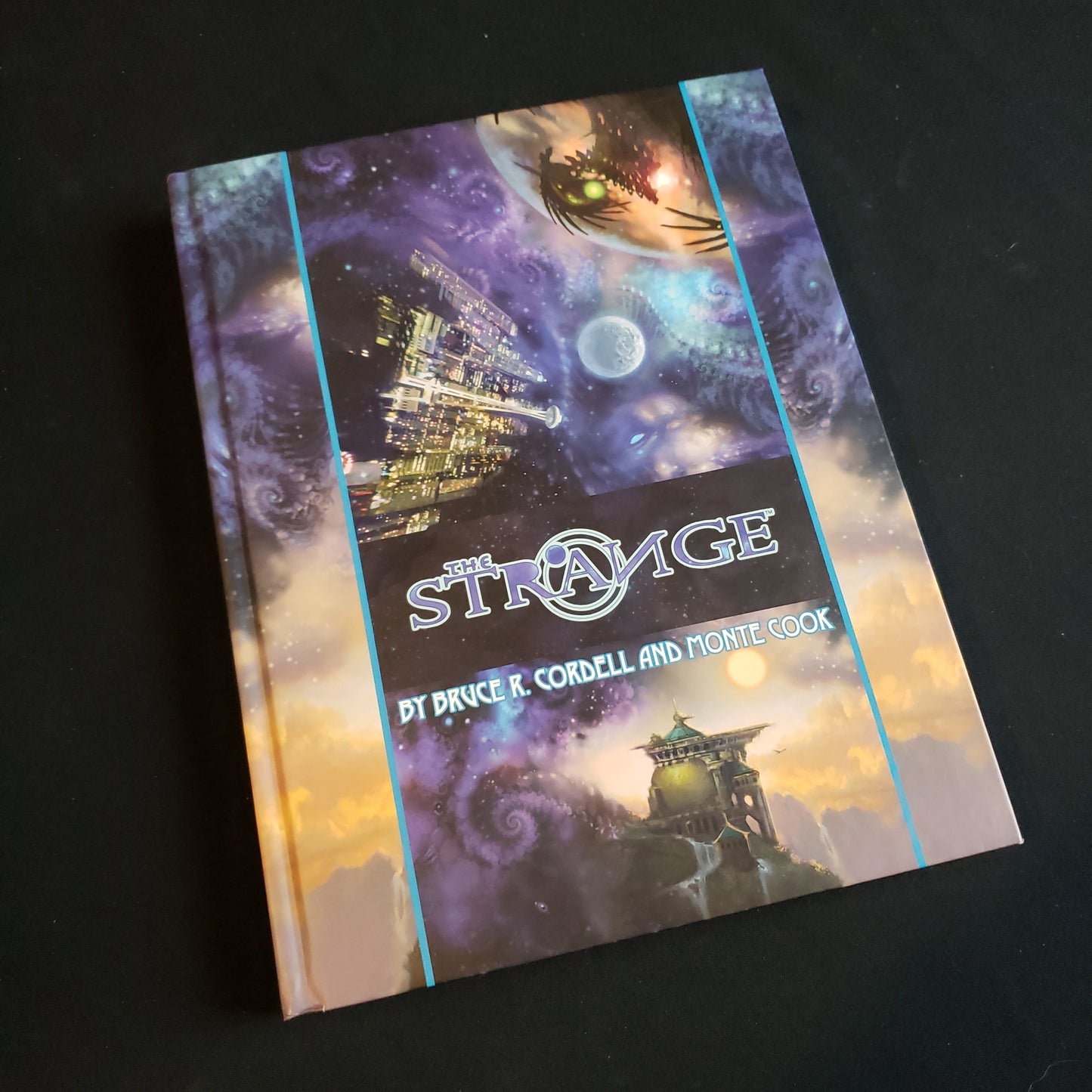 Image shows the front cover of The Strange roleplaying game book