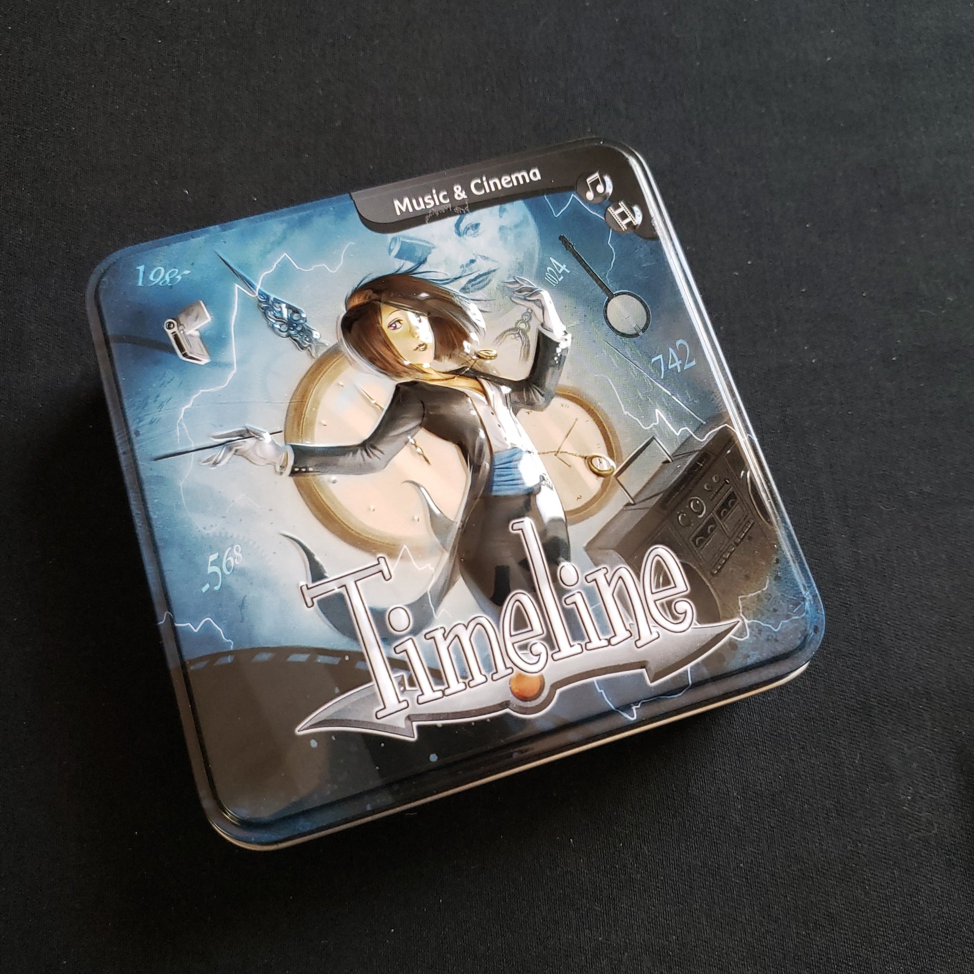 Image shows the front cover of the box of the Timeline: Music & Cinema card game