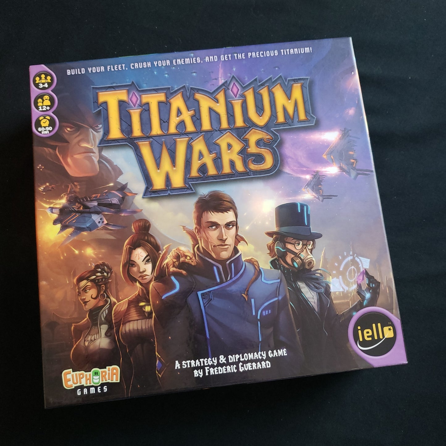 Image shows the front cover of the box of the Titanium Wars board game