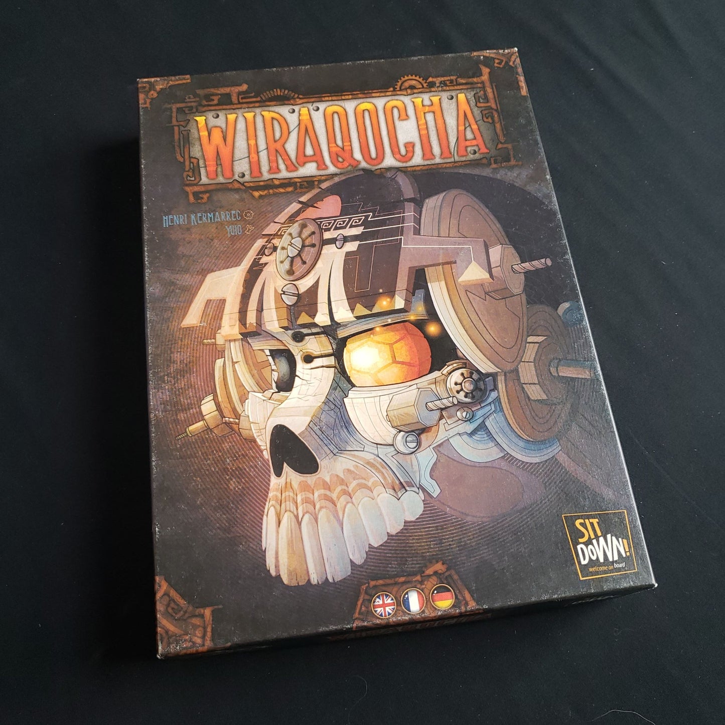 Image shows the front cover of the box of the Wiraqocha board game