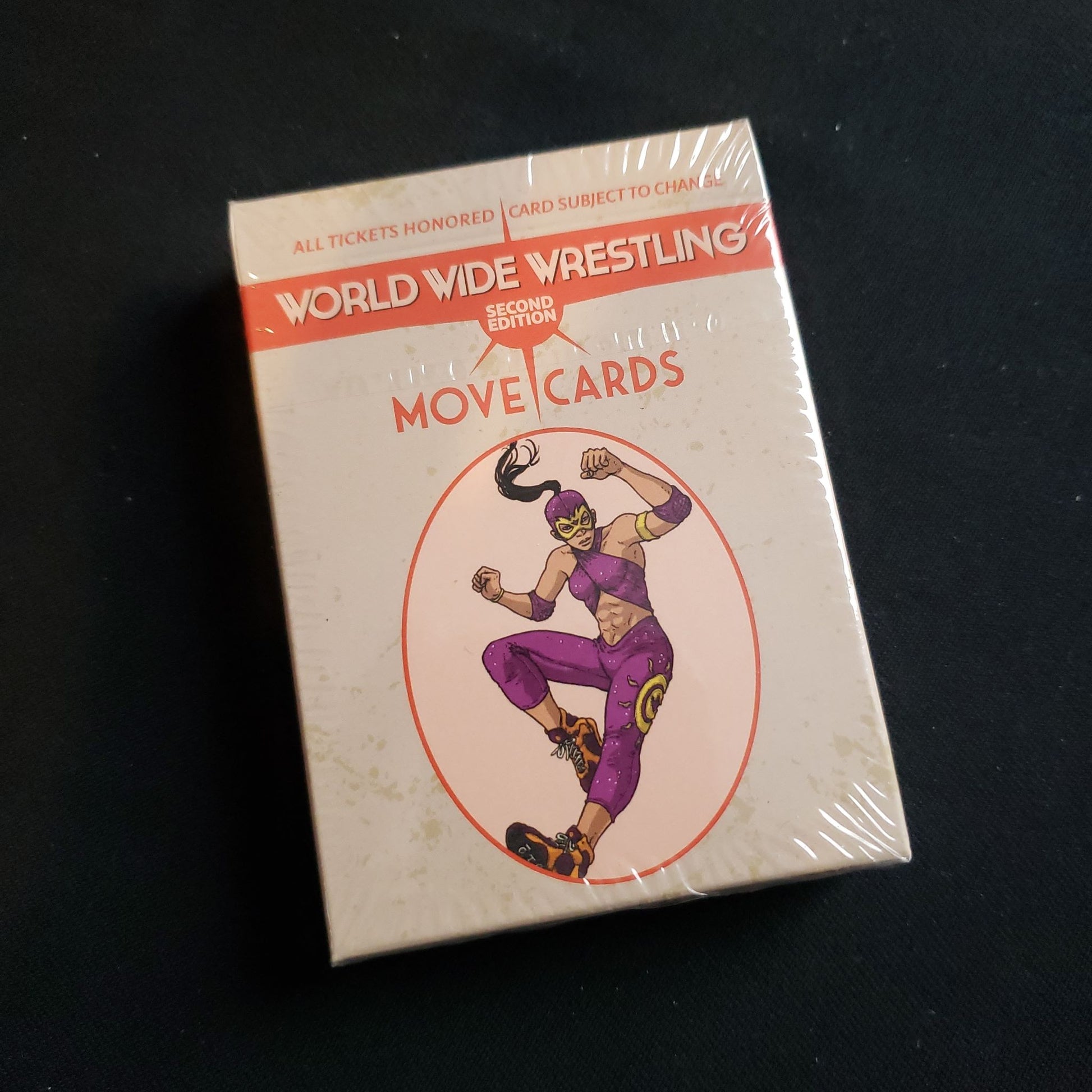 Image shows the front of the box of the Move Card deck for the World Wide Wrestling roleplaying game