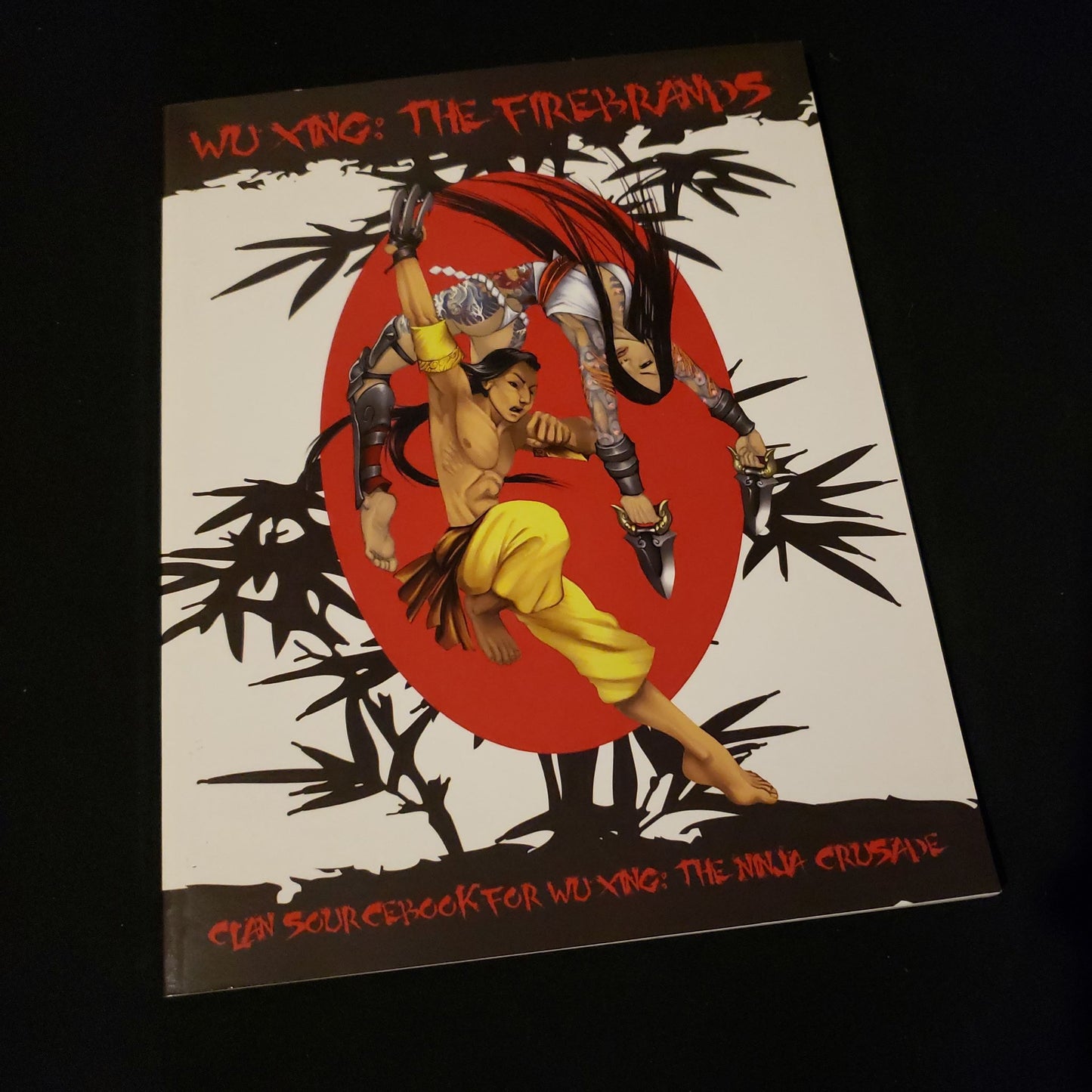 Image shows the front cover of the Firebrands clan book for the Wu Xing: The Ninja Crusade roleplaying game