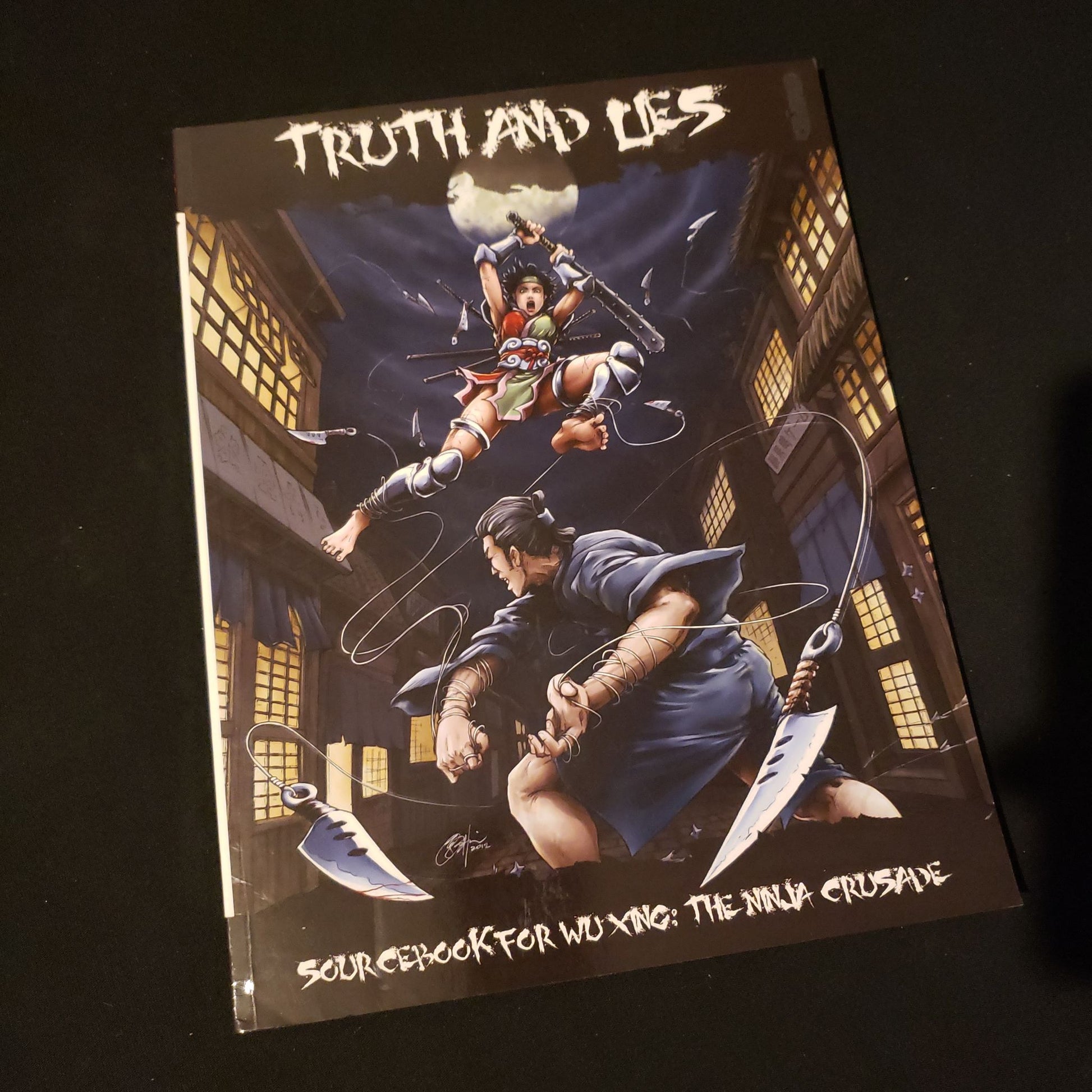 Image shows the front cover of the Truth and Lies book for the Wu Xing: The Ninja Crusade roleplaying game